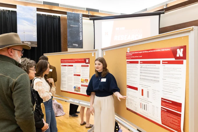 Grace Fowler, a CEHS student, presents her UCARE research poster at Nebraska Student Research Days.