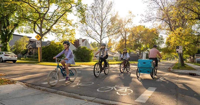 People cycling on the bike path