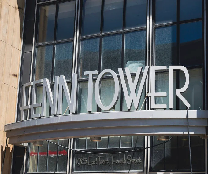 Fenn Tower sign above the entrance of the building.