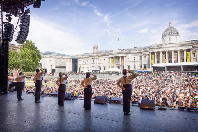 A photo showing the crowd as Operation Mincemeat performs on stage at West End LIVE in Trafalgar Square. 