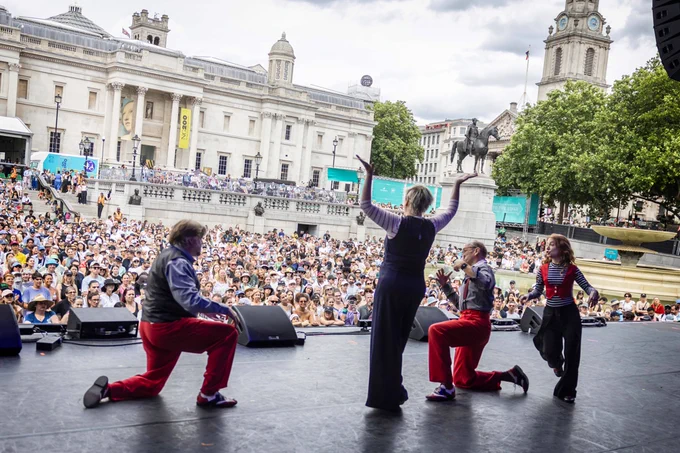 A photo showing the crowd as Showstopper! The Improvised Musical performs on stage at West End LIVE in Trafalgar Square. 