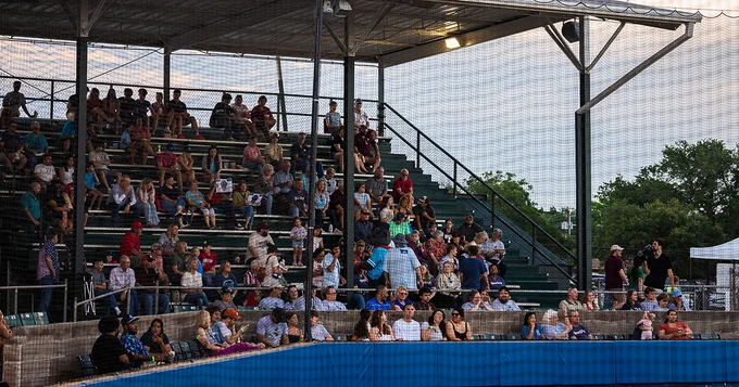 Crowd in one part of the grandstand at Travis Major Field.