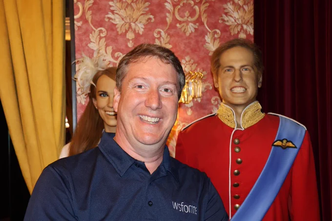 A photo of Mark Westguard at the Krakow wax museum standing in front of, allegedly, Prince William.