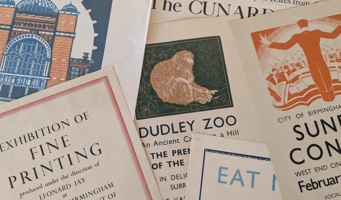 A melange of overlapping posters, chiefly pre – WW2 designs. The central one is for Dudley Zoo. Another on the bottom left is for an exhibition of fine printing. Print on the top left is a lithograph of the exterior of the Great Hall at Birmingham University. 