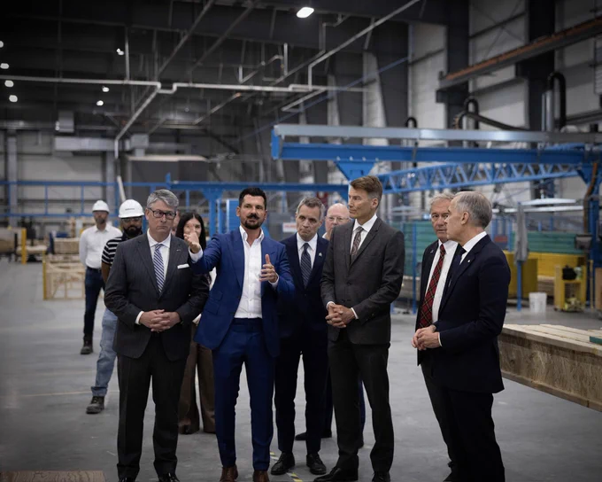 Prime Minister Carney touring a home manufacturing facility.