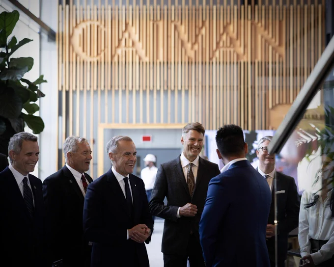 Prime Minister Carney touring a home manufacturing facility.