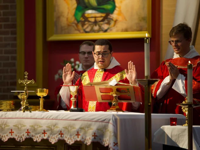 Fr. Raphael Arteaga, O.P. '19 celebrates Mass at the altar
