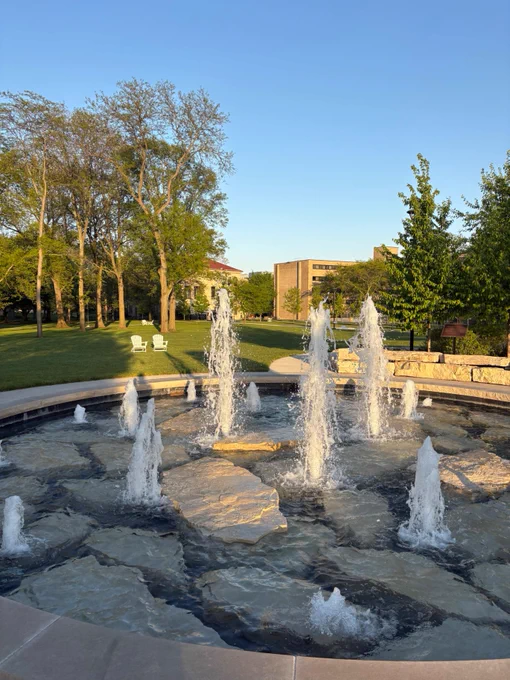 Fountain surrounded by greenery on BGSU campus