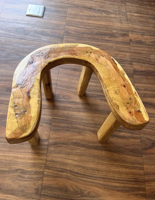 This is a wooden Birth Stool