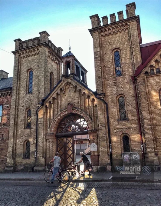 Long shadows are cast by the setting sun streaming through the Katedral school doors. Lund, Sweden. Gary Moore photo. Real World Photographs. #lund #sweden #photojournalism #weather #world #shadow #school #realworldphotographs #photography #people #travel #places #garymoorephotography