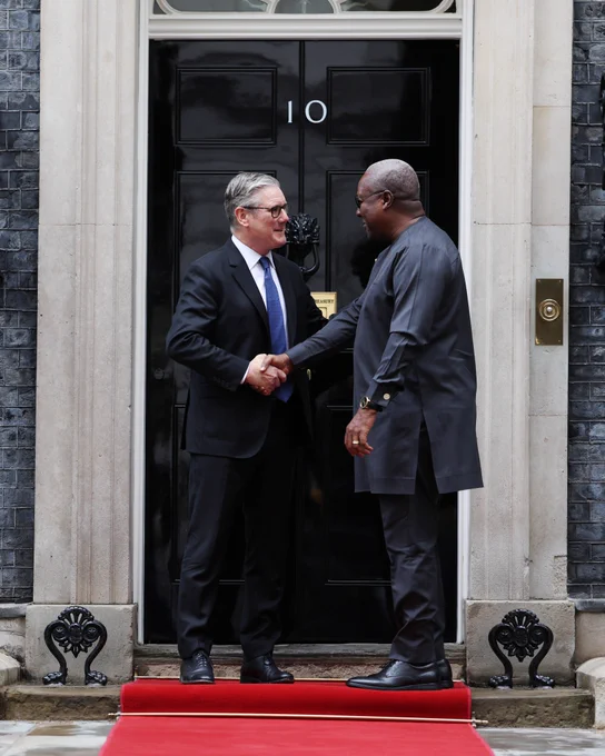 PM Keir Starmer meets the President of Ghana on the steps of Downing Street.