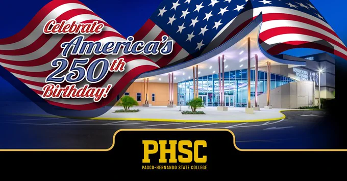 The U.S. flag above PHSC's Instructional Performing Arts Center with text stating "celebrate America's 250th Birthday!"