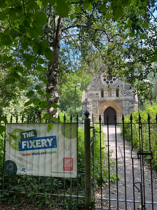 The Fixery sign outside Grove Gardens Chapel on a sunny day