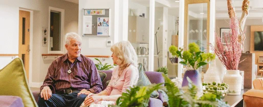 Two elderly people in the lounge