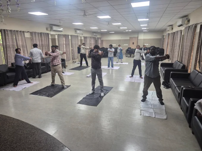 Practicing yoga by all staff 