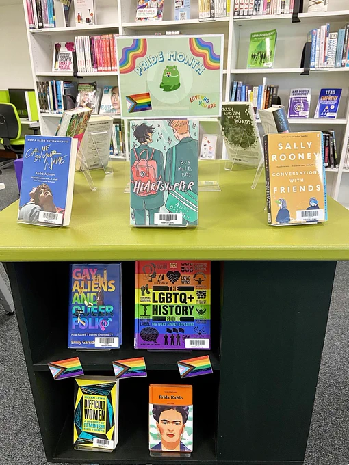 A Pride Month book display with a selection of LGBTQ  themed books.