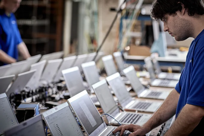 A technician's laptop screen showing the "Verification Successful" window and tamper-proof audit trail generated by OceanTech's in-house software.