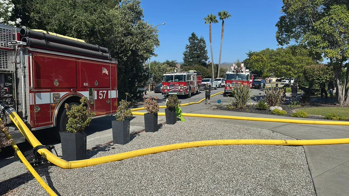 Picture of Morgan Hill fire engines and hose lines deployed off the fire engines