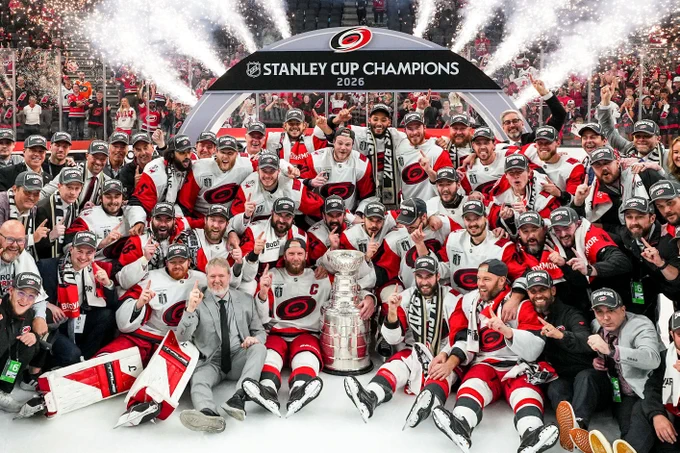Team photo of the Carolina Hurricanes with the Stanley Cup