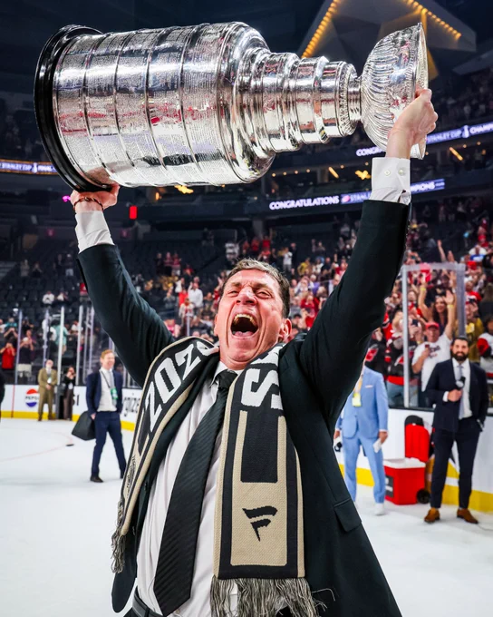 Photo of Rod Brind'Amour hoisting the Cup