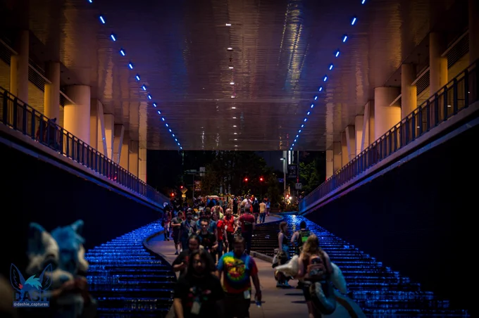 A nighttime shot of the lit-up walkway down to the waterfront at the David L Lawrence Convention Center