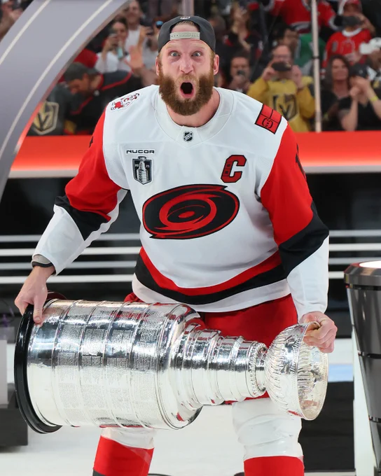 Photo of Jordan Staal in a Carolina Hurricanes uniform with the Stanley Cup