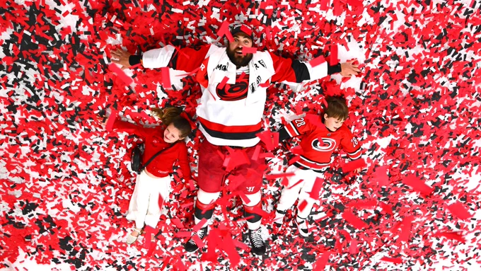 Photo of William Carrier and his kids in the confetti