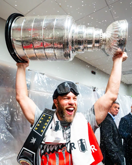 Photo of Taylor Hall celebrating with the Stanley Cup.