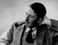 Gordon Welchman OBE seen smoking a pipe.