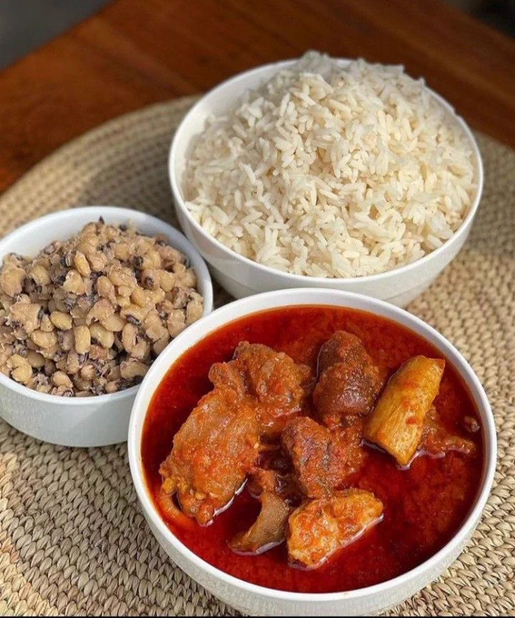A plate of Rice, beans and stew 🍲