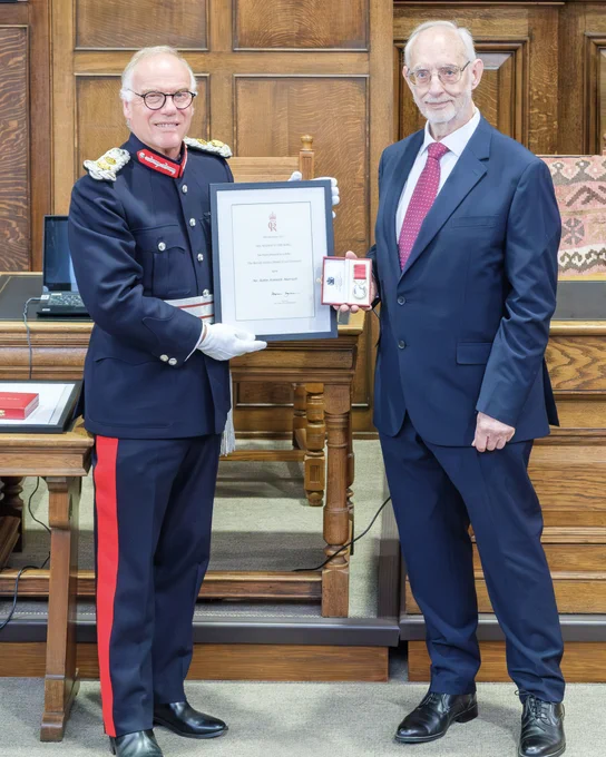 HM Lord-Lieutenant of Northamptonshire presenting Mr. Robin Marriott with his BEM (British Empire Medal)  for services to the community in Northampton.