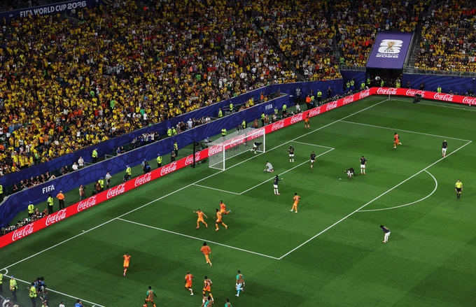 Amad celebrates his goal for Ivory Coast v Ecuador at the World Cup.