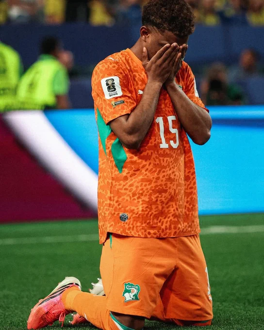 Amad celebrates his goal for Ivory Coast v Ecuador at the World Cup.