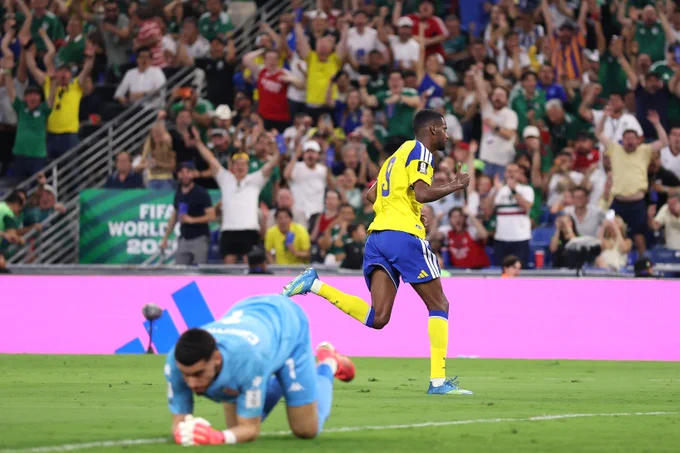 An image of Alexander Isak celebrating after scoring against Tunisia in Group F of the World Cup