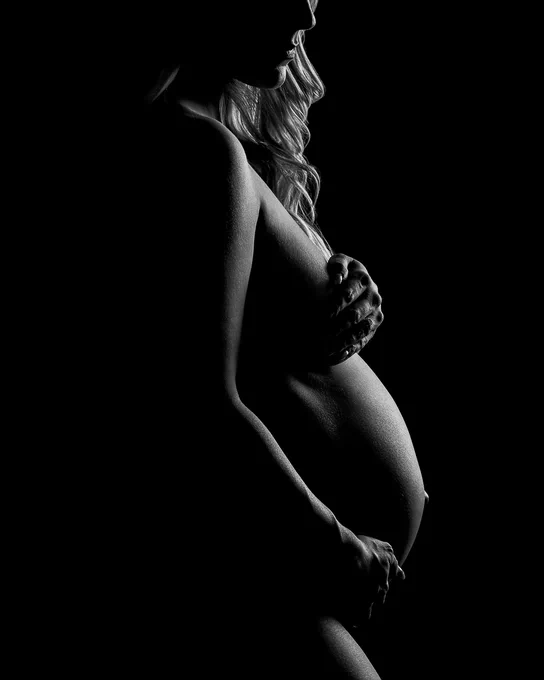 Phoenix Fine Art Maternity Photography: Black and white fine art maternity photography in silhouette.