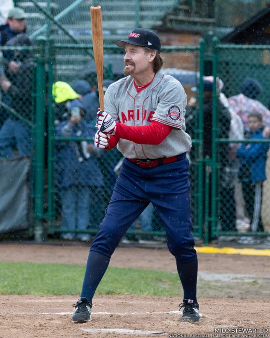 Wade Boggs wears a Marines jersey and stands in the open side of his left-handed stance as he participates in a home run derby at Doubleday Field. (Milo Stewart Jr./National Baseball Hall of Fame and Museum)