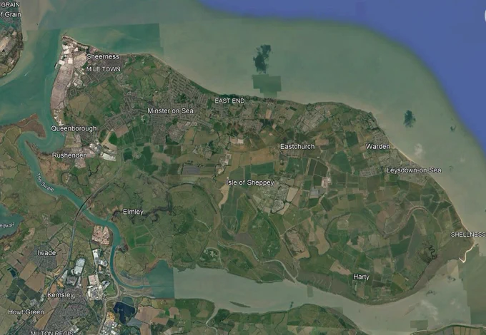 Satellite imagery of Isle of Sheppey is an island off the northern coast of Kent, England, neighbouring the Thames Estuary. Source Google Earth