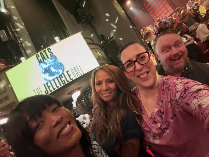 Angela in a selfie with others
