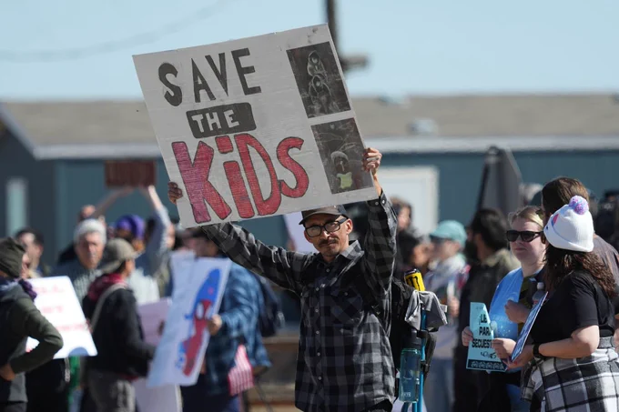 Protesters gather outside the South Texas Family Residential Center