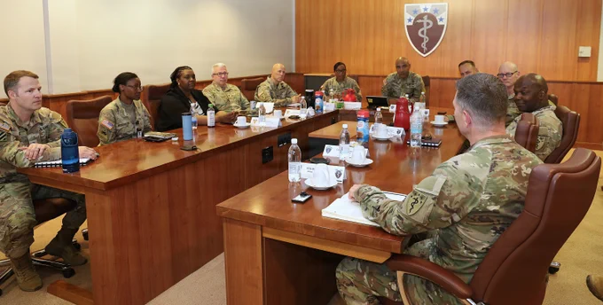 U.S. Army Brig. Gen. Tracy Michael, commanding general of the 68th Theater Medical Command, Brig. Gen. Lance Raney (Incoming Commanding General, 68th TMC and Command Surgeon, U.S. Army Europe and Africa) and Command Sgt. Maj. Kyle Brunell, met with Maj. Gen. Jennifer Marrast Host, commander of the 3rd Theater Medical Command (Deployment Support), and Command Sgt. Maj. Todd Kaim during a visit to the 68th Theater Medical Command, in Sembach, Germany. (U.S. Army photos by Sgt. 1st Class Eric Johnson)
