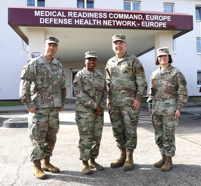 U.S. Army Brig. Gen. Mark Stackle, commander of Medical Readiness Command, Europe, and Command Sgt. Maj. Kalani Kalili, met with Maj. Gen. Jennifer Marrast Host, commander of the 3rd Theater Medical Command (Deployment Support), and Command Sgt. Maj. Todd Kaim during a visit to the Medical Readiness Command, Europe headquarters in Semback, Germany. (U.S. Army photo by Kirk Frady)