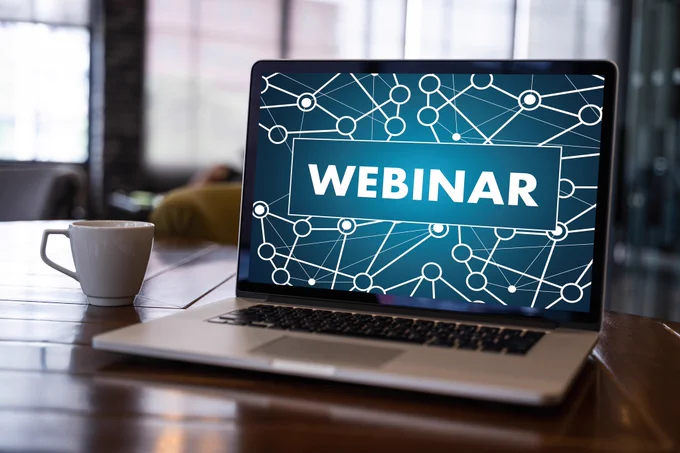 The word, webinar, on a laptop screen.