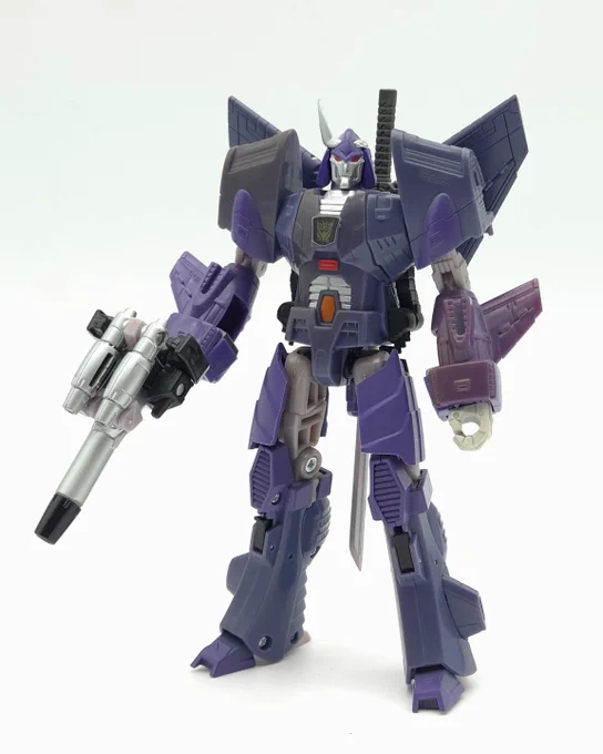 A Transformers Reveal The Shield Cyclonus figure with the MakeToys Hurricane add-on kit installed, wielding his Targetmaster Nightstick.