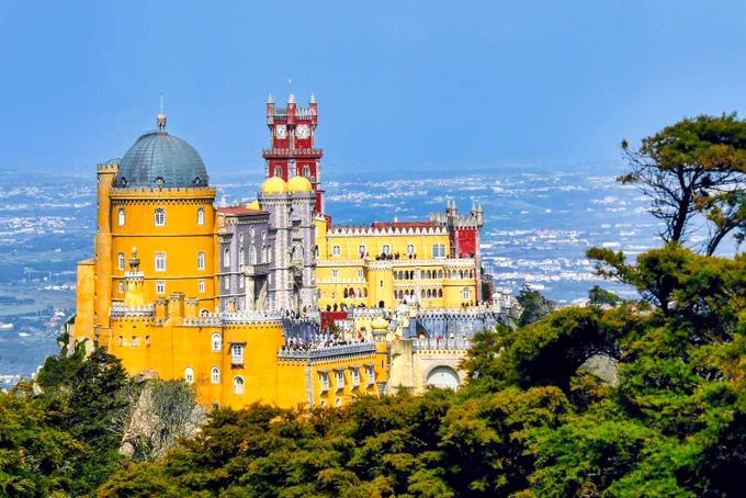 See Pena Palace, a romantic and colourful national monument as well as a UNESCO World Heritage Site 