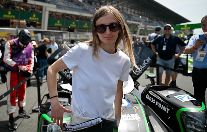 French driver Doriane Pin poses before the 94th edition of the 24 Hours of Le Mans at the Le Mans circuit, north-western France, on June 13, 2026. (Photo by LOU BENOIST / AFP via Getty Images)