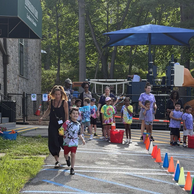 teacher and student run relay race