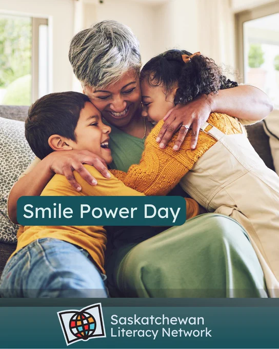 The picture is of one adult and two children sitting together on a couch. They are hugging and smiling with each other.  The caption reads 'Smile Power Day' and the post is from the Saskatchewan Literacy Network. The Network logo is in the lower middle section and has a stylized book with a stylized globe in front of it, symbolizing the world of opportunities that are possible through literacy and learning. www.saskliteracy.ca  ​
​