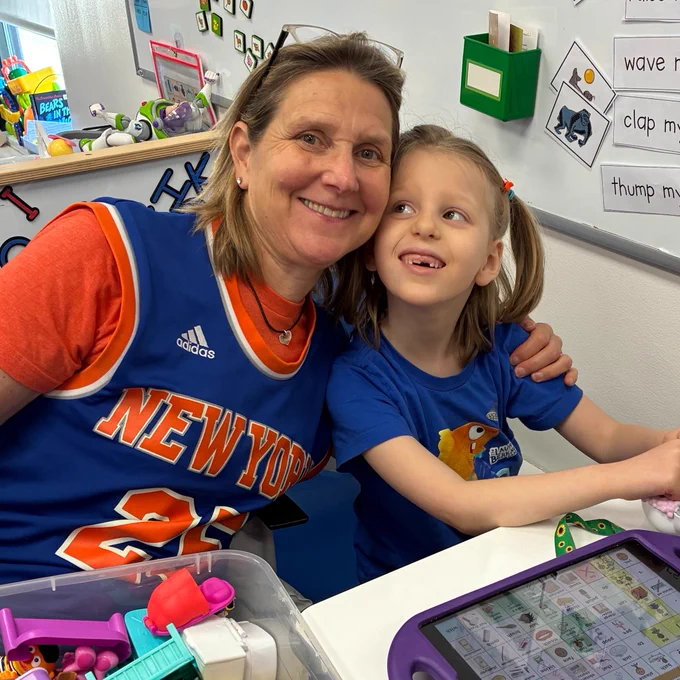teacher and student in Knicks gear