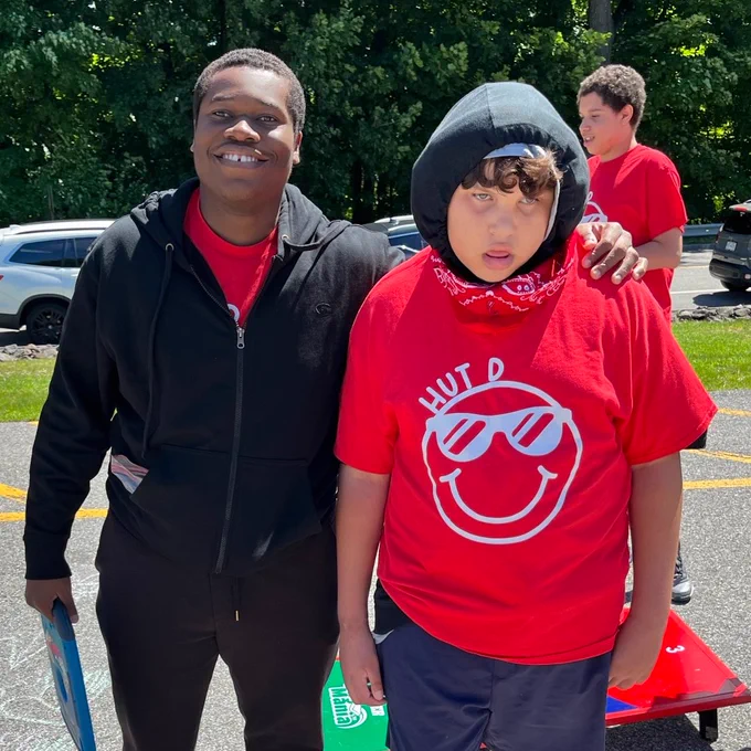 teacher and student outside on Field Day