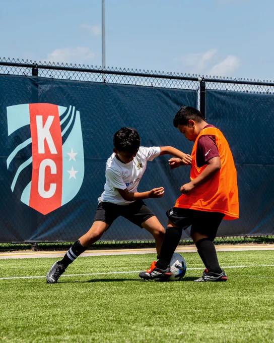 Kids playing soccer at the WorldCoaches clinic